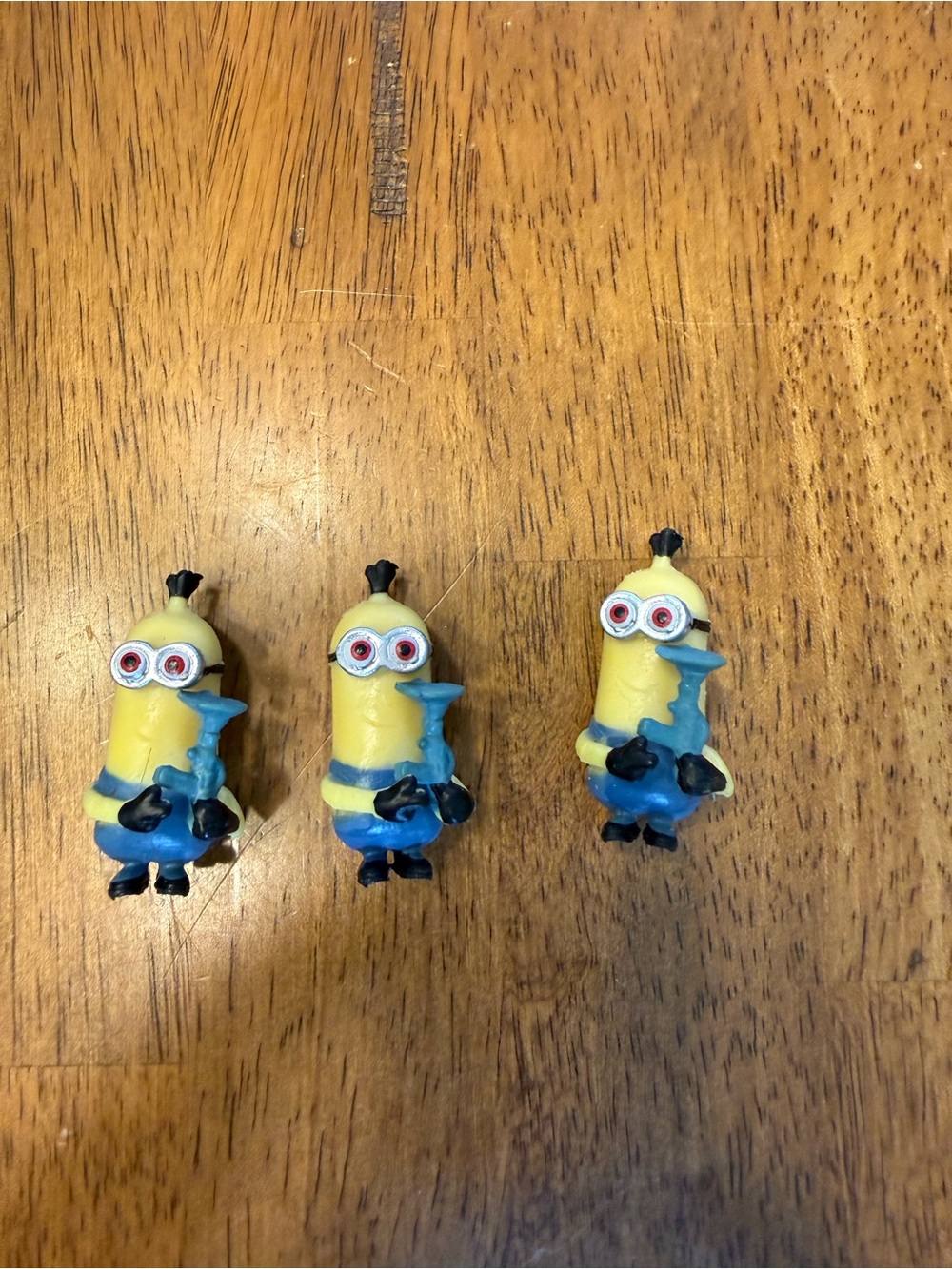 Set of 3 Yellow Character Toy Figures with Blue Outfits